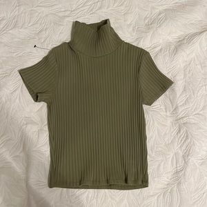 green turtleneck top